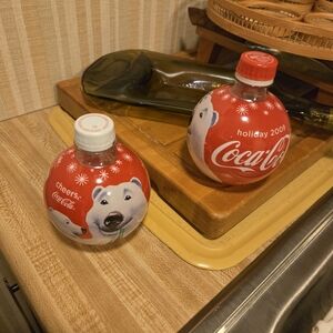 2 Coca-Cola Holiday 2009 plastic bottles